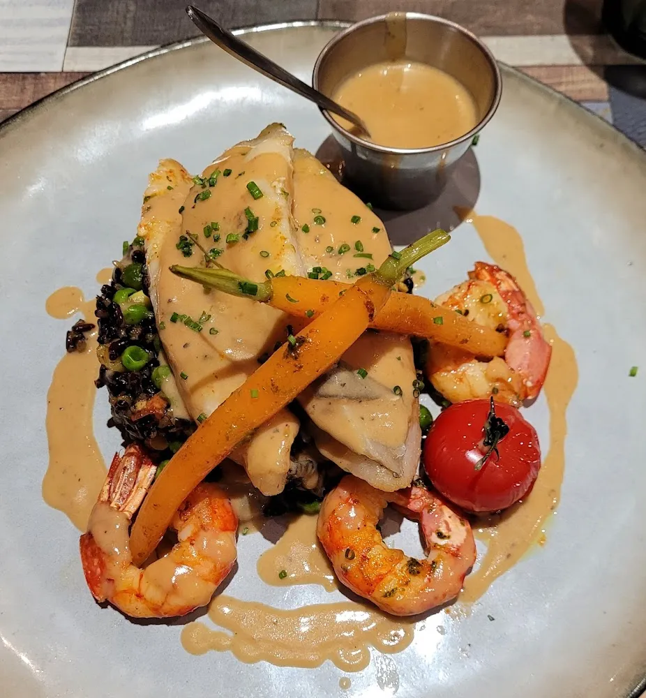 Filet de Saint Pierre Et Son Riz Noir Façon Paëlla